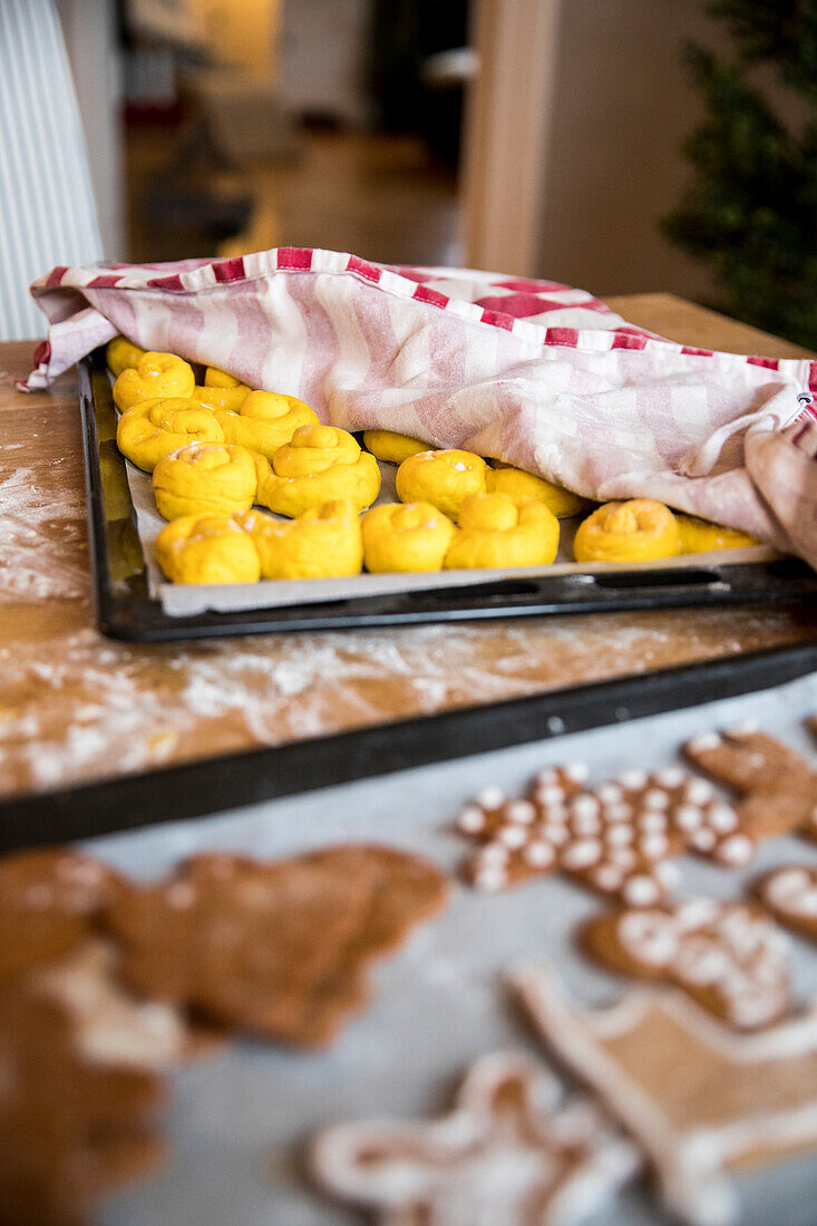 Homemade gingerbread cookies and saffron rolls