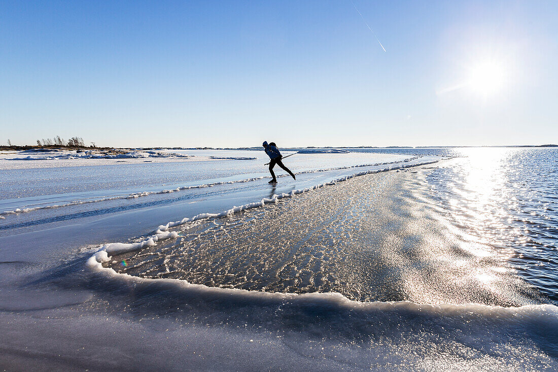 Long distance skater on ice