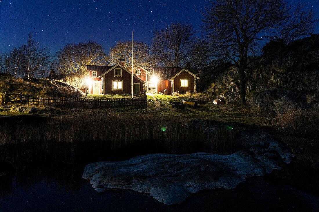 Wooden houses at night