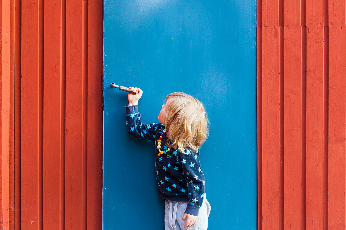 Girl opening door