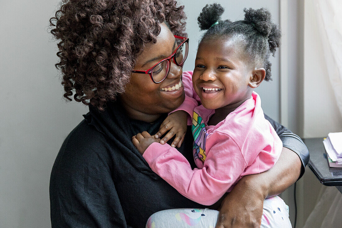 Happy mother and daughter