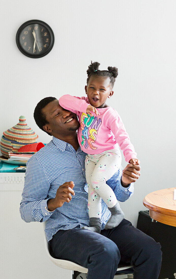 Father and daughter playing