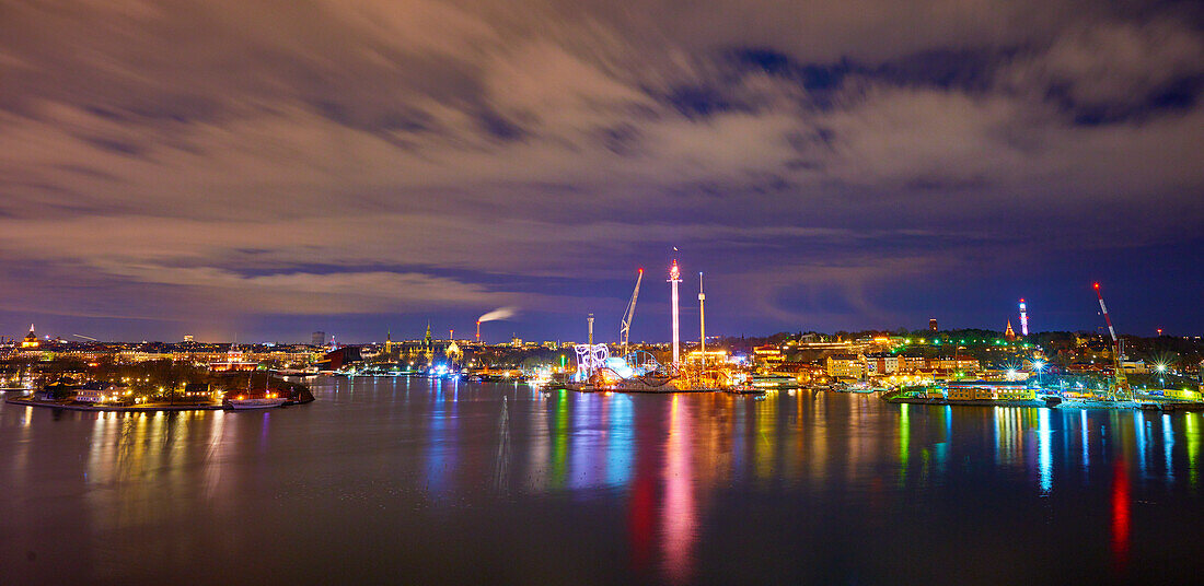 Waterfront and harbor illuminated at night