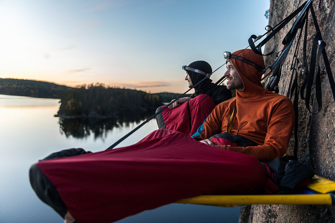 Two hikers resting in portaledge