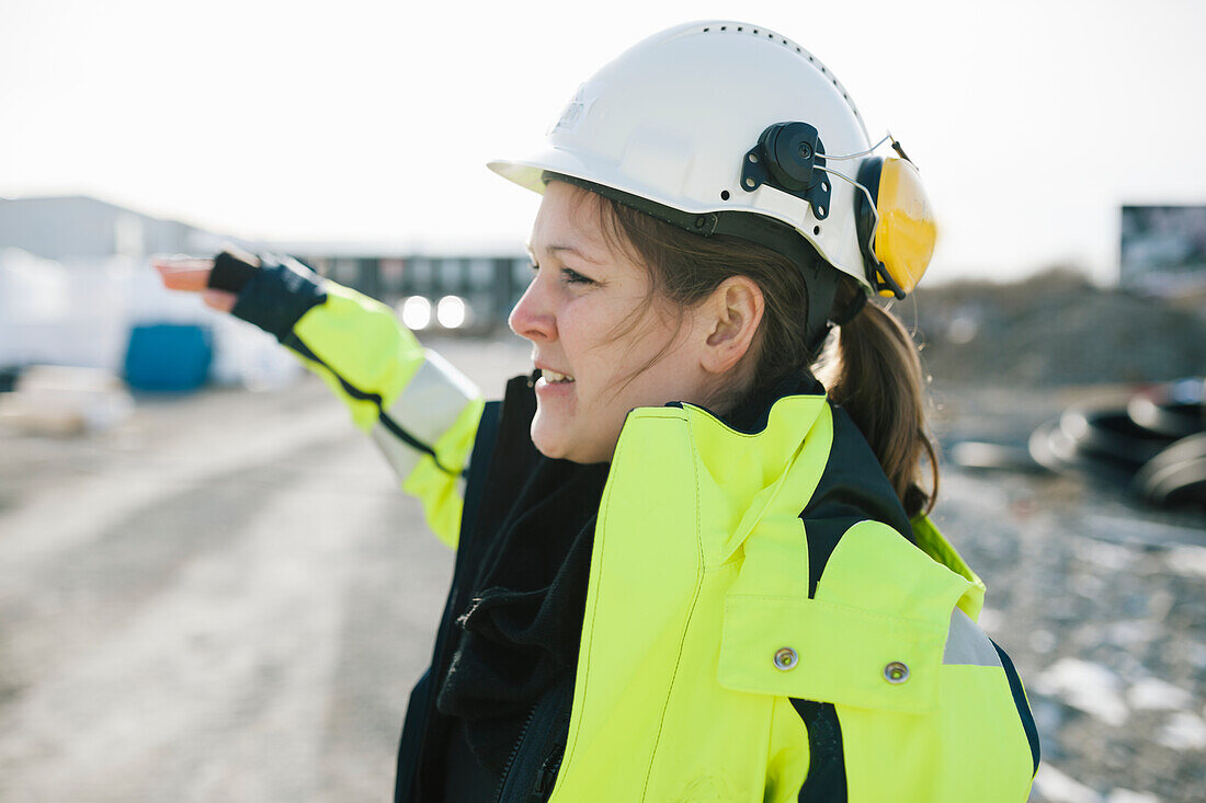 Female construction worker on building site