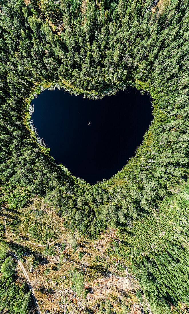 Aerial image of heart shaped lake