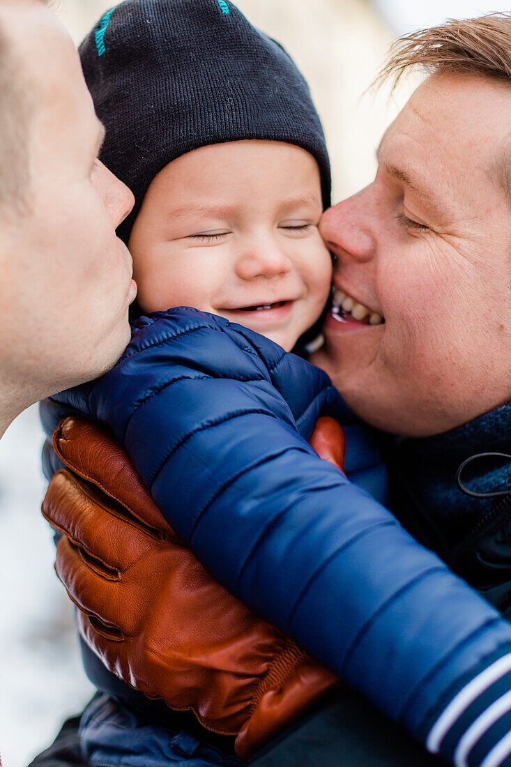 Männliches Paar mit Sohn