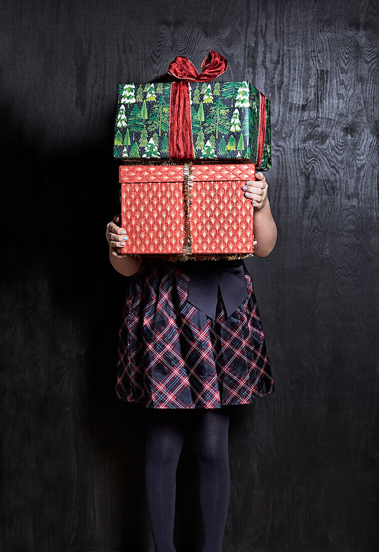 Girl holding presents