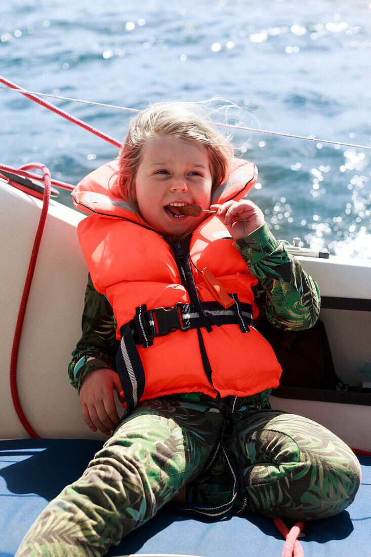 Smiling girl on boat