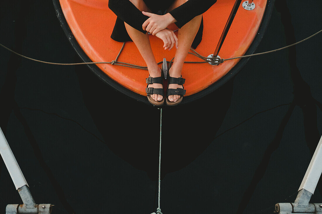 Woman sitting on boat