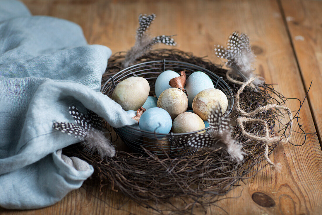 Easter eggs in twig nest