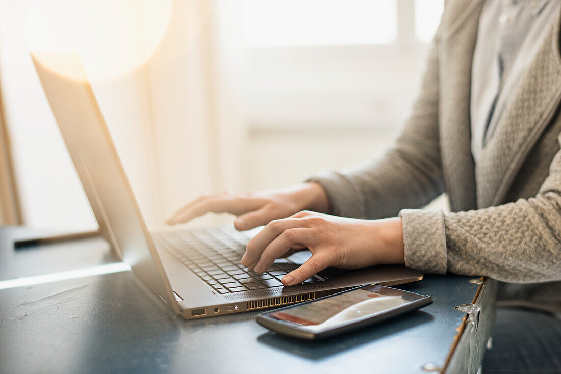 Woman using laptop