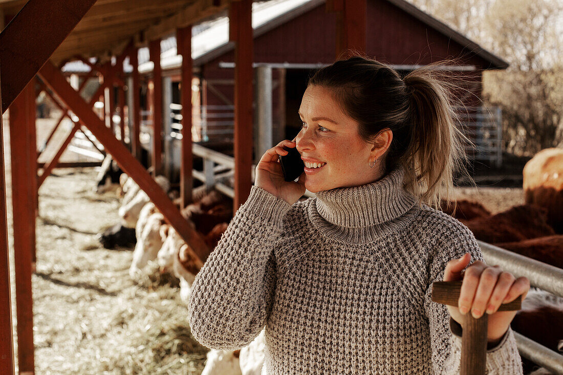 Woman in cowshed