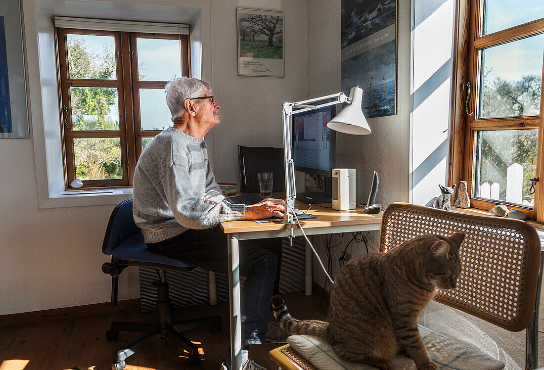 Senior man using computer