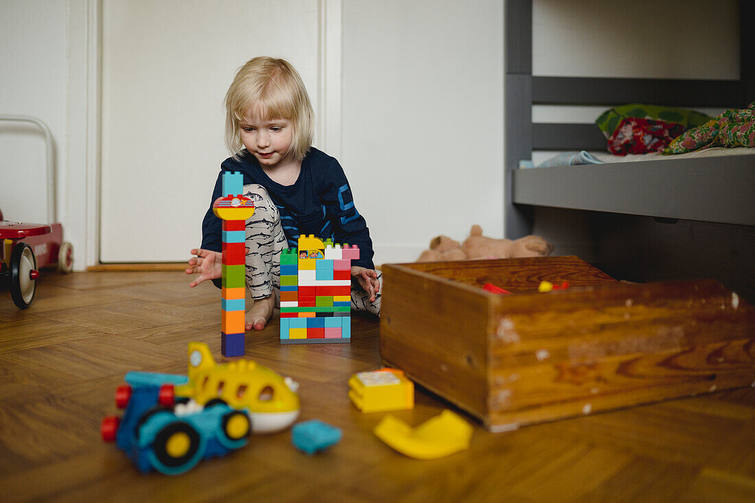 Girl playing building blocks
