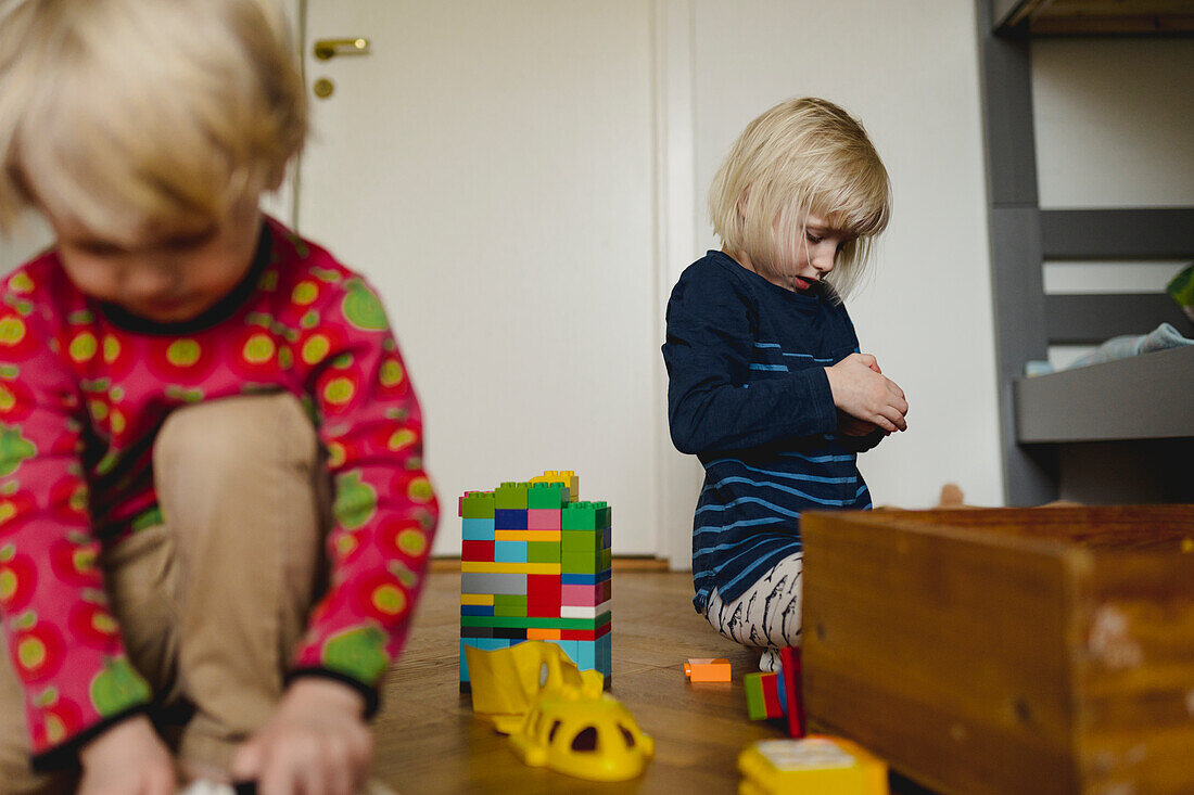 Siblings playing