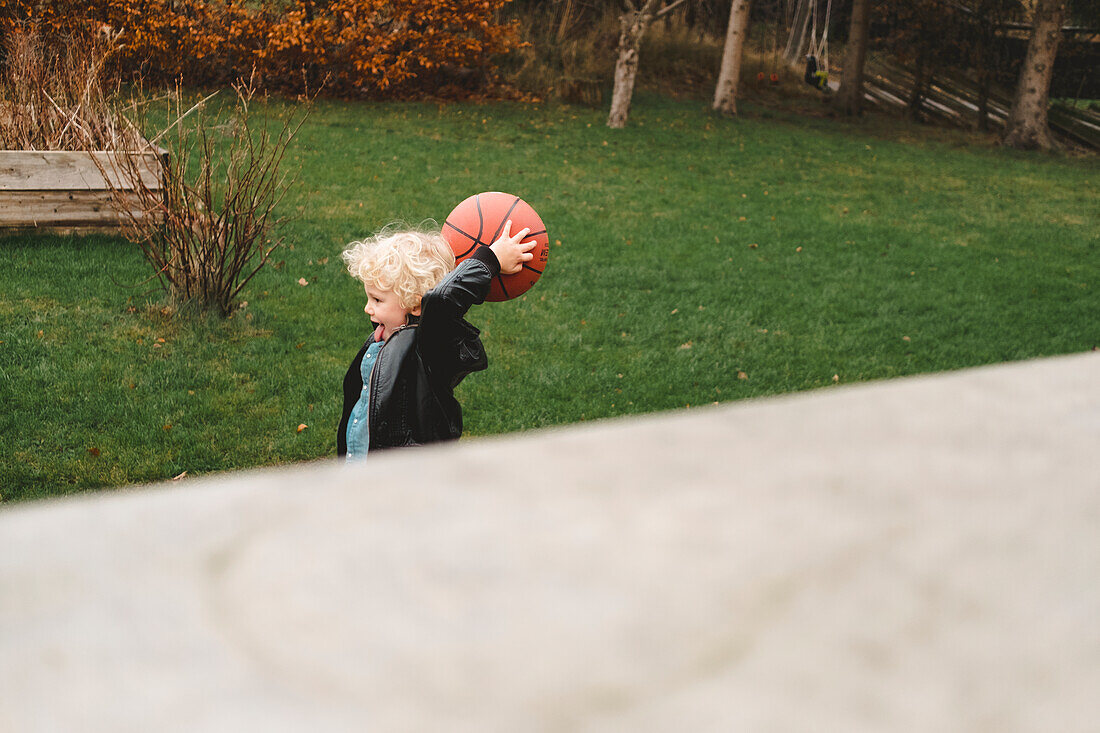 Boy playing in garden