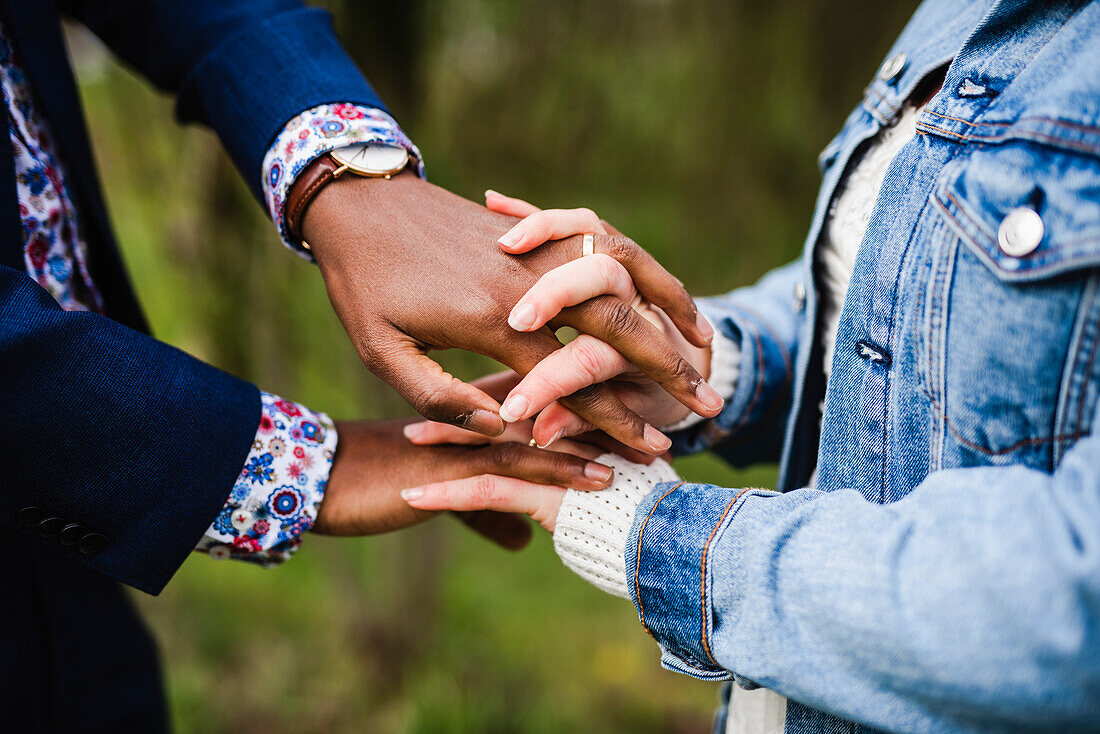 Couple holding hands