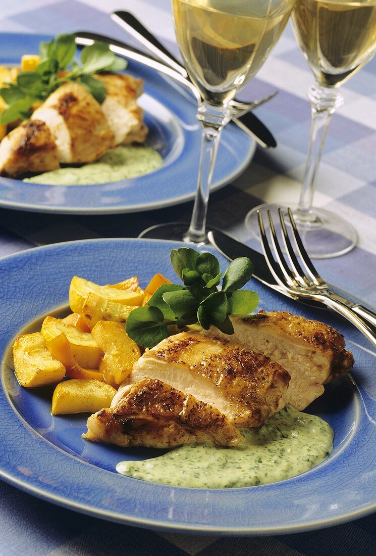 Fried chicken breast fillet with watercress sauce