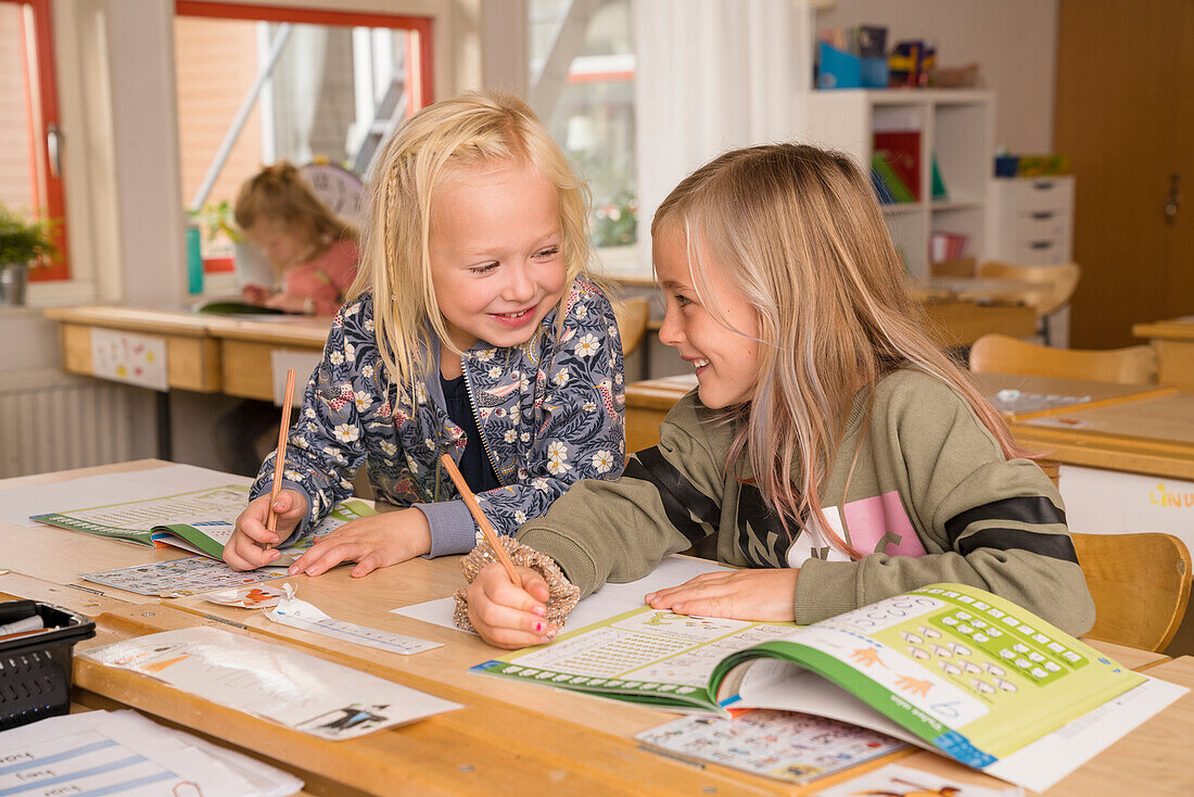 Smiling girls in classroom