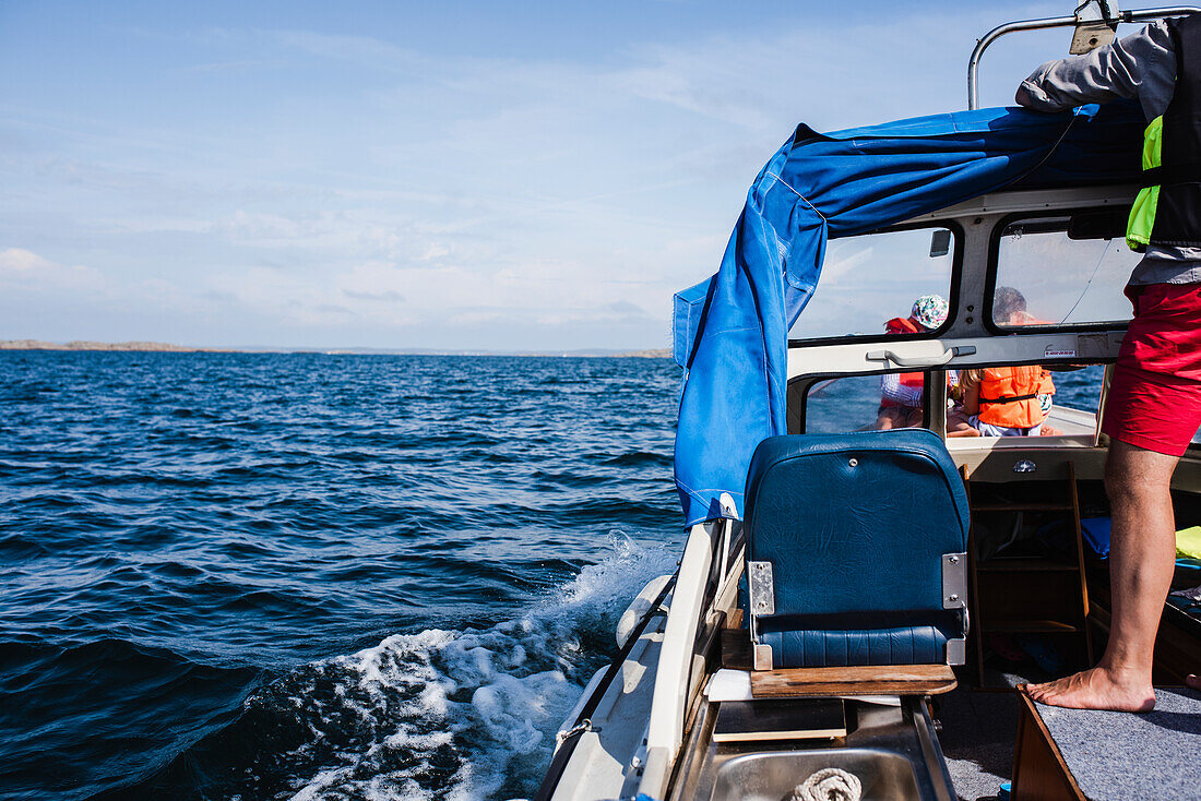 People on boat at sea