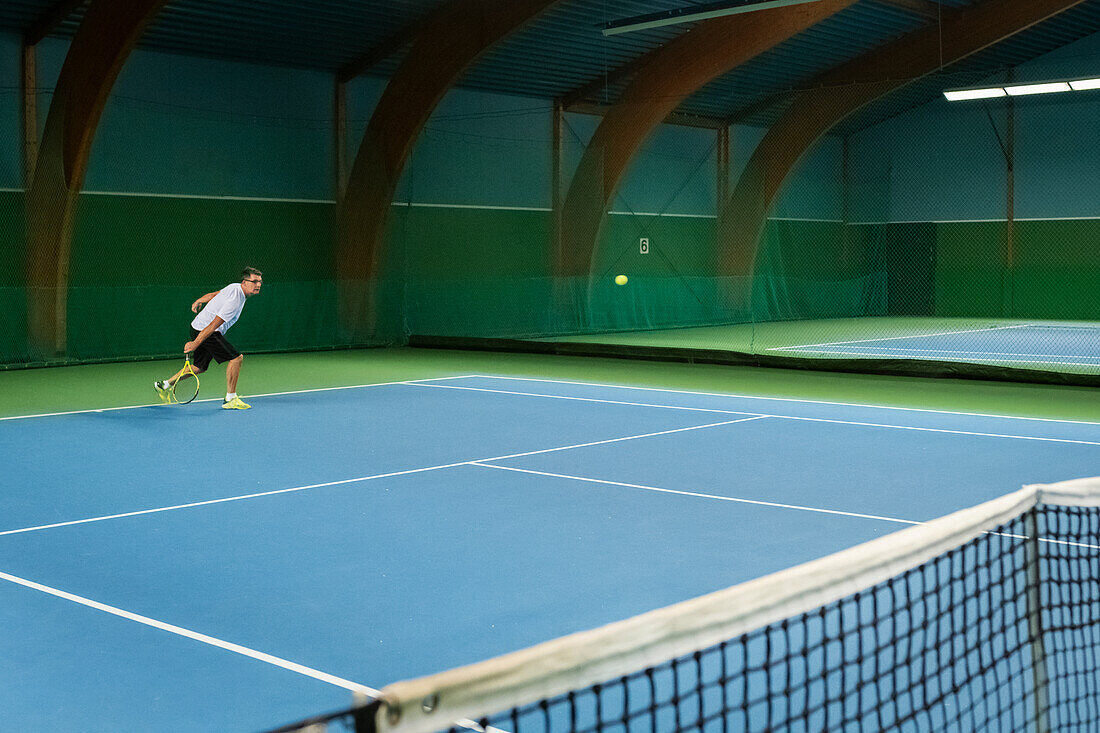 Man playing tennis