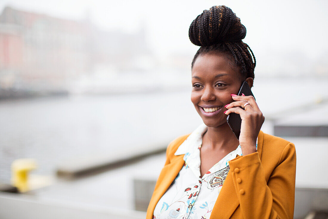 Smiling woman on the phone