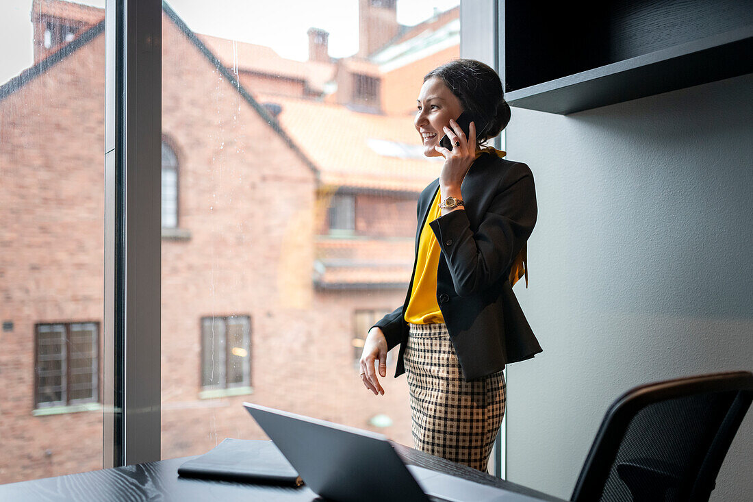 Businesswoman on the phone in office