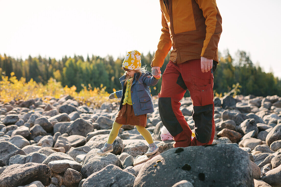 Father walking with daughter