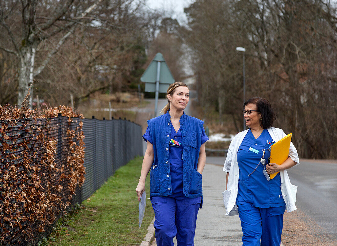 Female doctors walking together