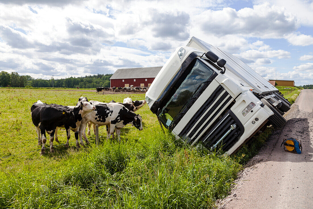 Overturned lorry on road side