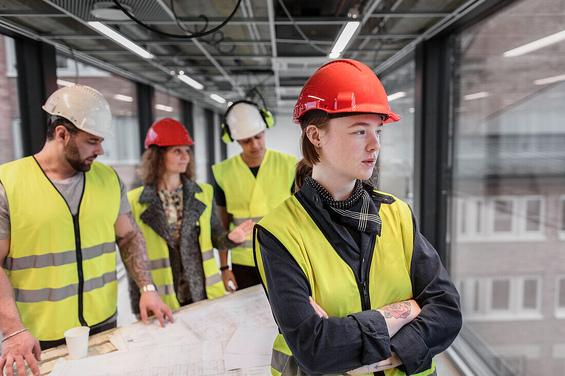 Female worker wearing hardhat