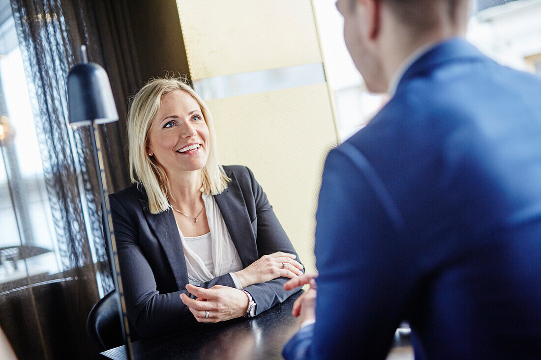 Smiling woman in cafe