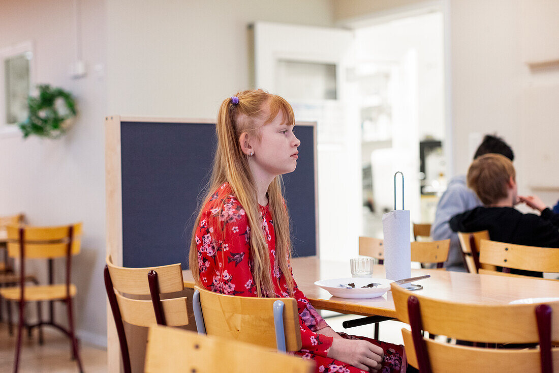 Girl sitting in classroom