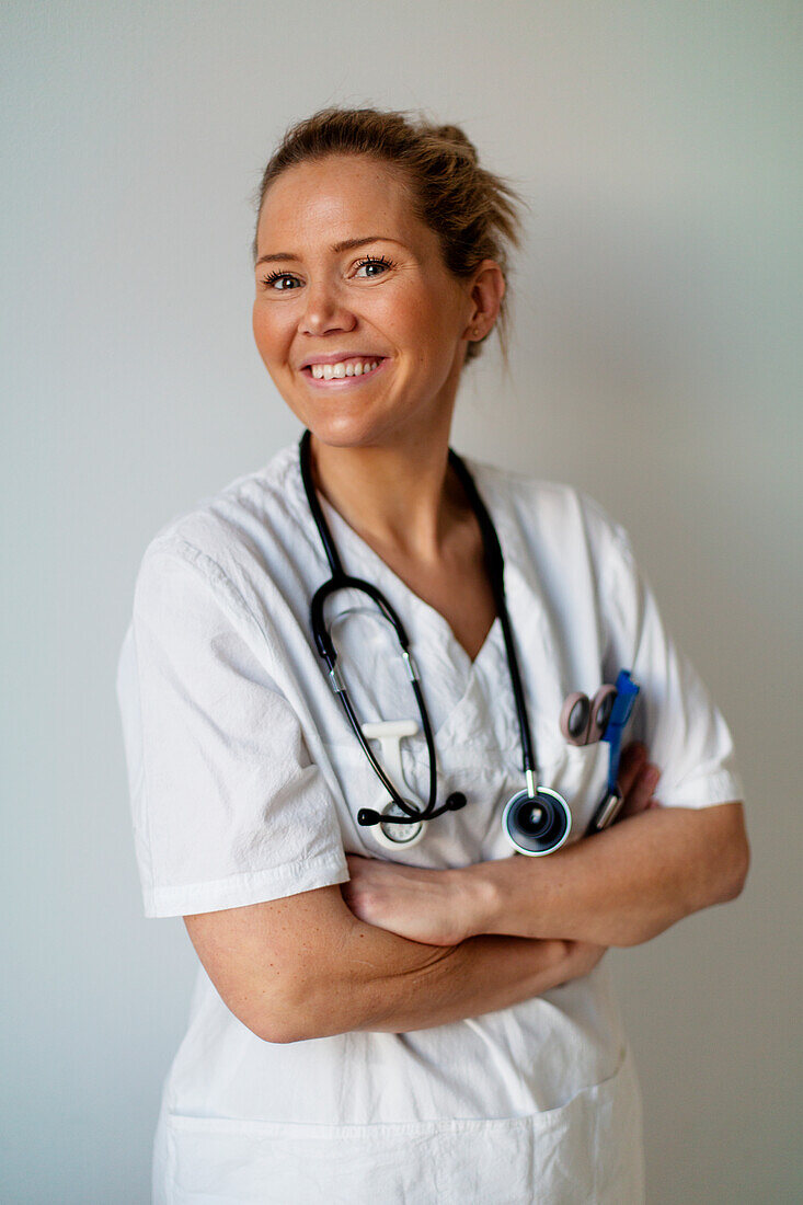 Female doctor looking at camera