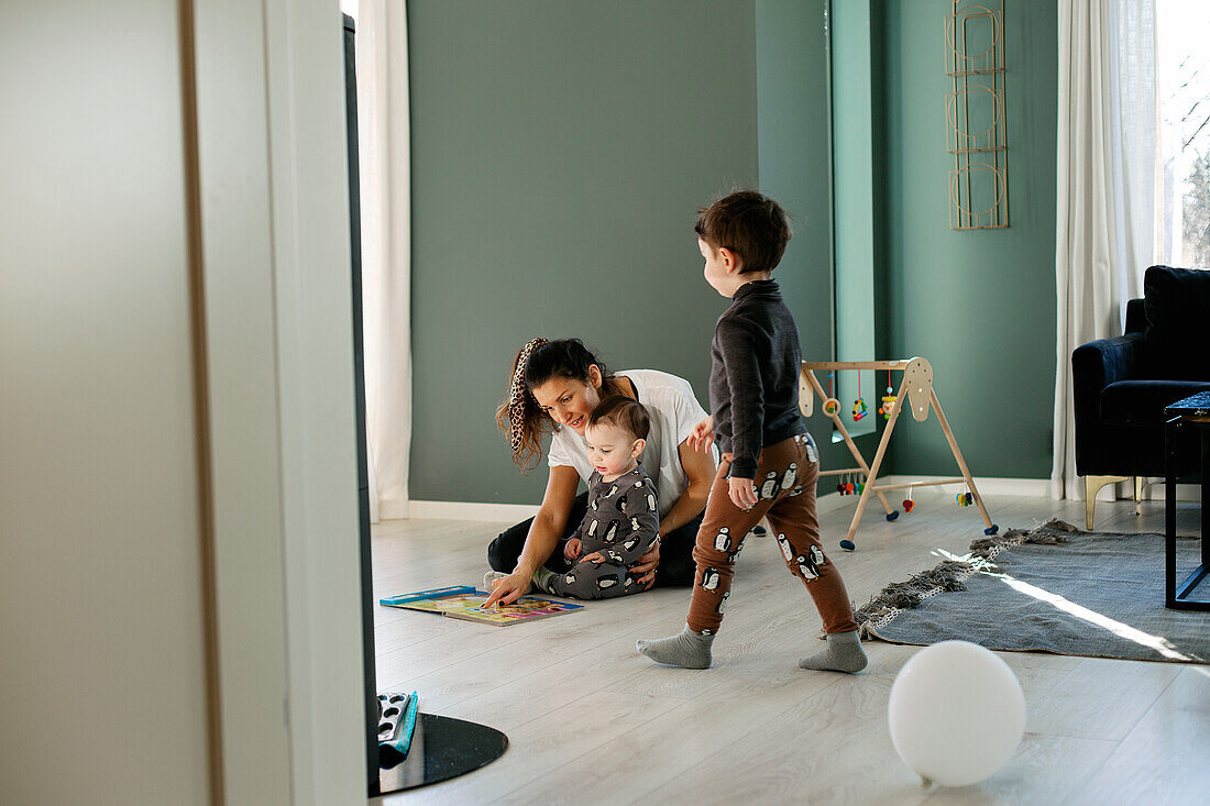 Mother with sons at home