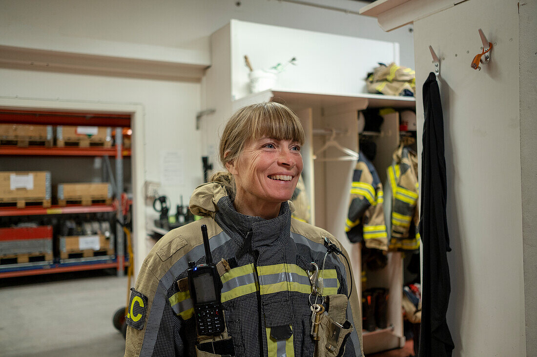Smiling female firefighter