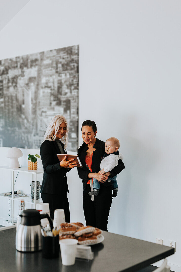 Estate agent showing woman house