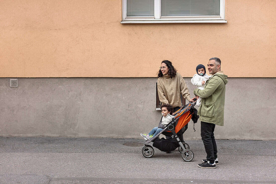 Parents with two children having walk