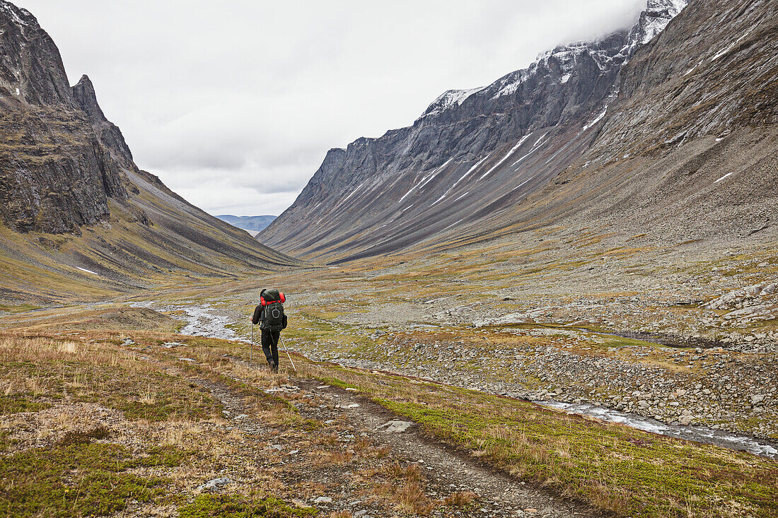 Rear view of hiker in mountains