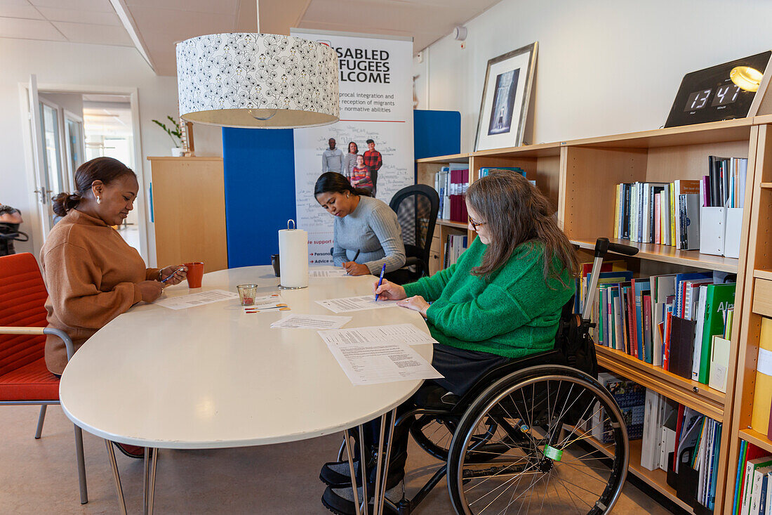 Disabled woman working in office