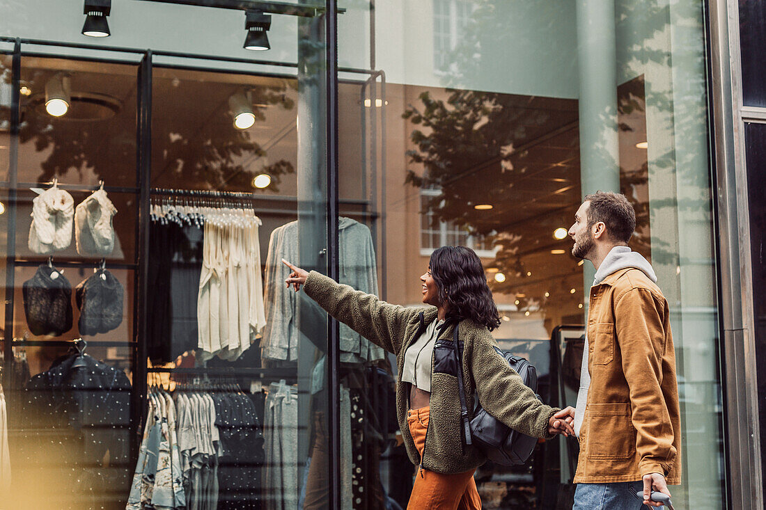 Couple looking at shop window