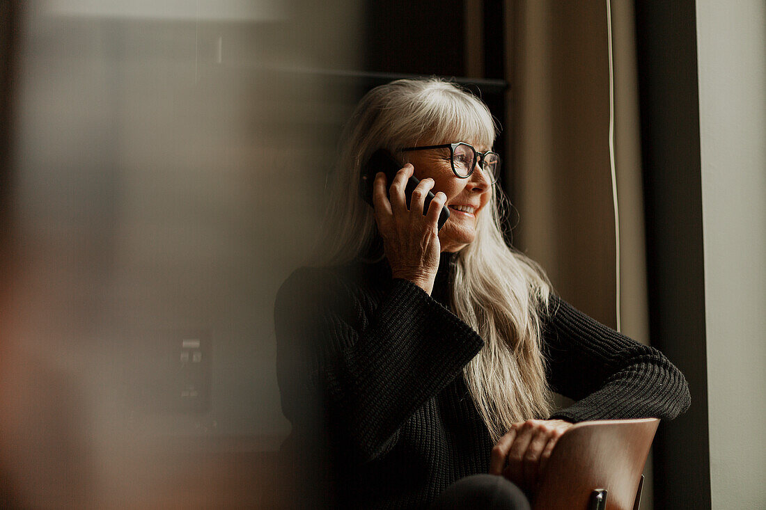 Senior woman using cell phone