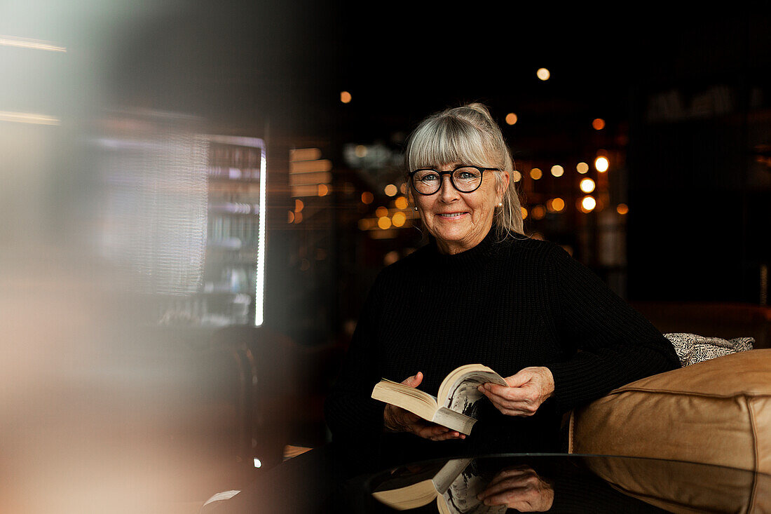 Mature woman in cafe