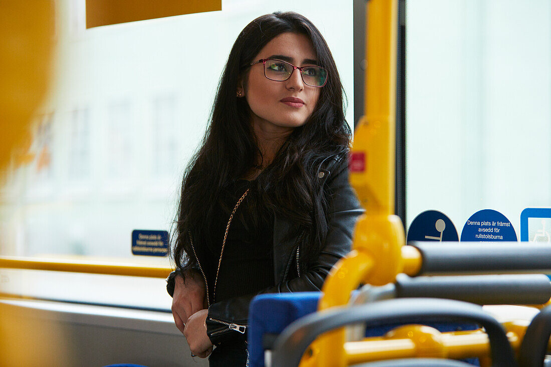 Young woman in bus