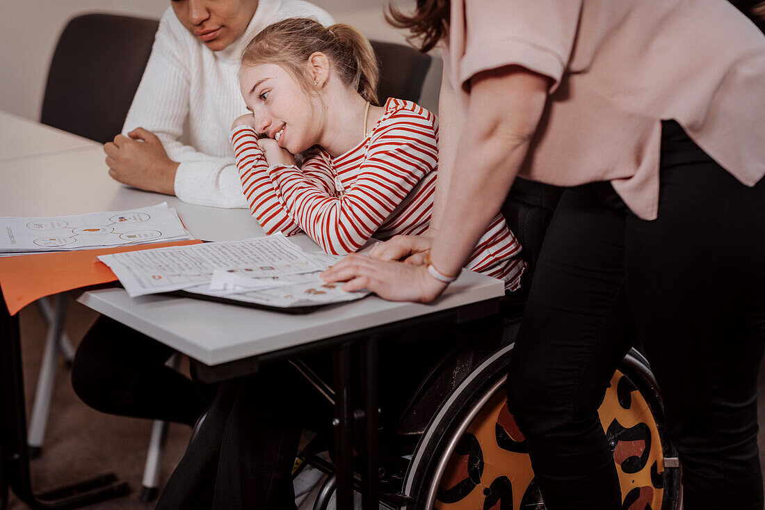 Girl on wheelchair in classroom