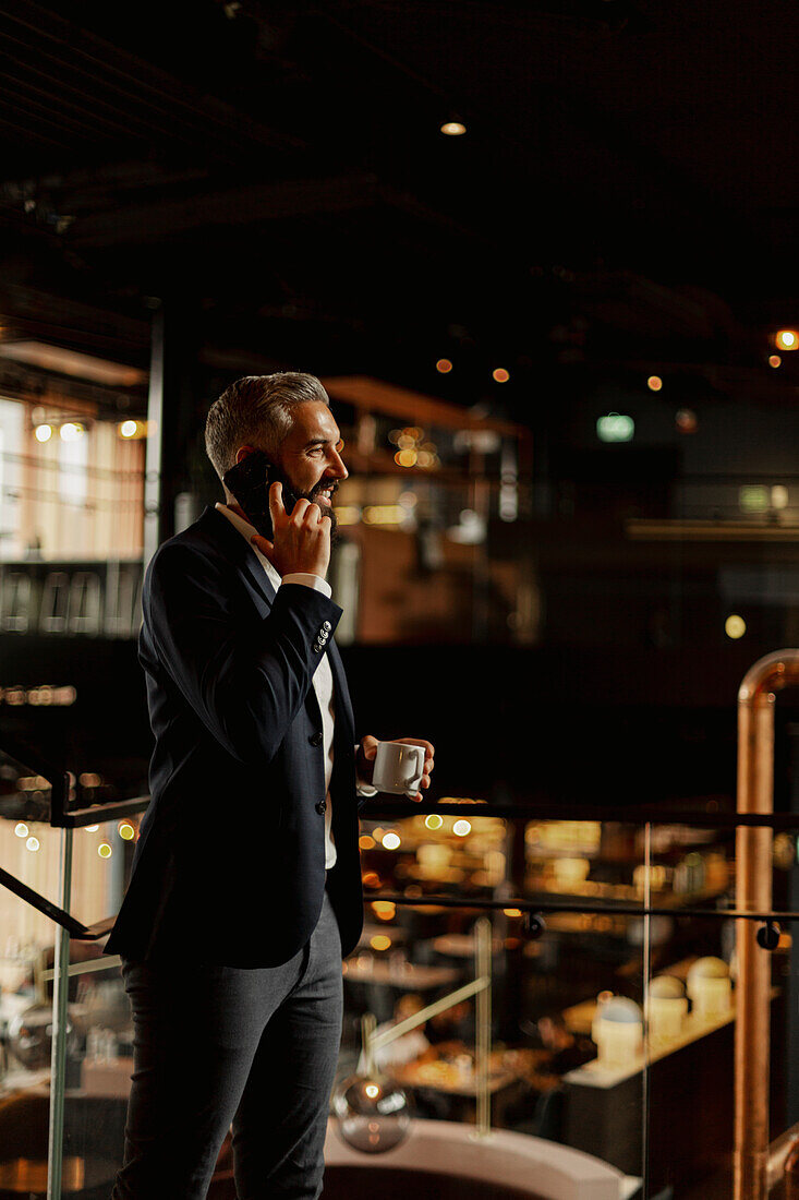 Businessman talking via cell phone