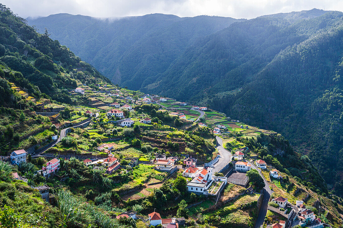 High angle view of village on mountain slope