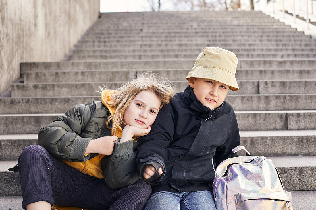 Children sitting on stairs