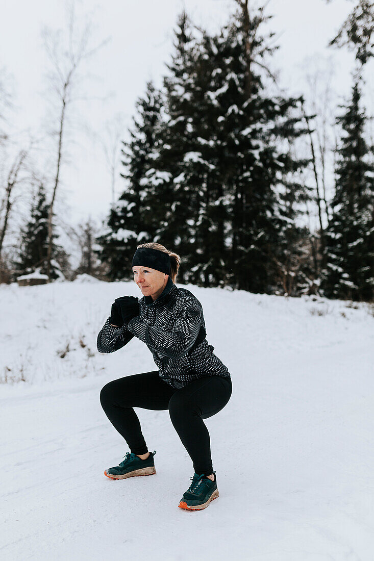 Woman exercising at winter